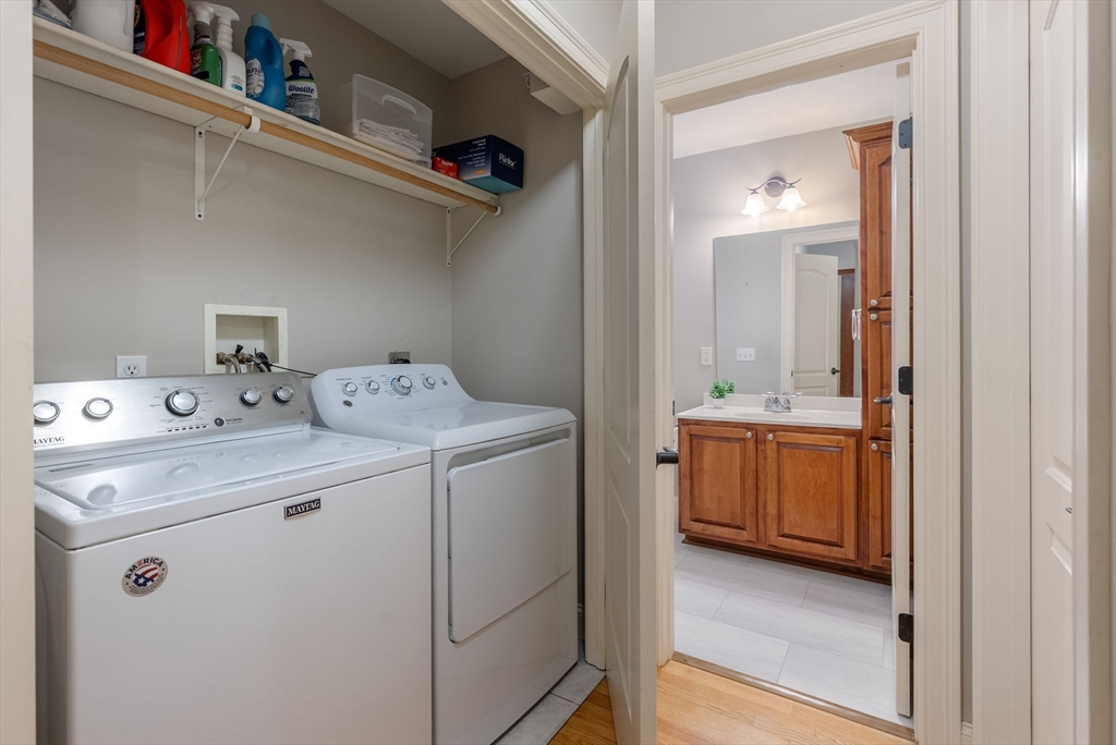 156 Canterbury Way, Unit 156 West Springfield, MA 01089 - Photo 24 of 32 a utility room with dryer and washer