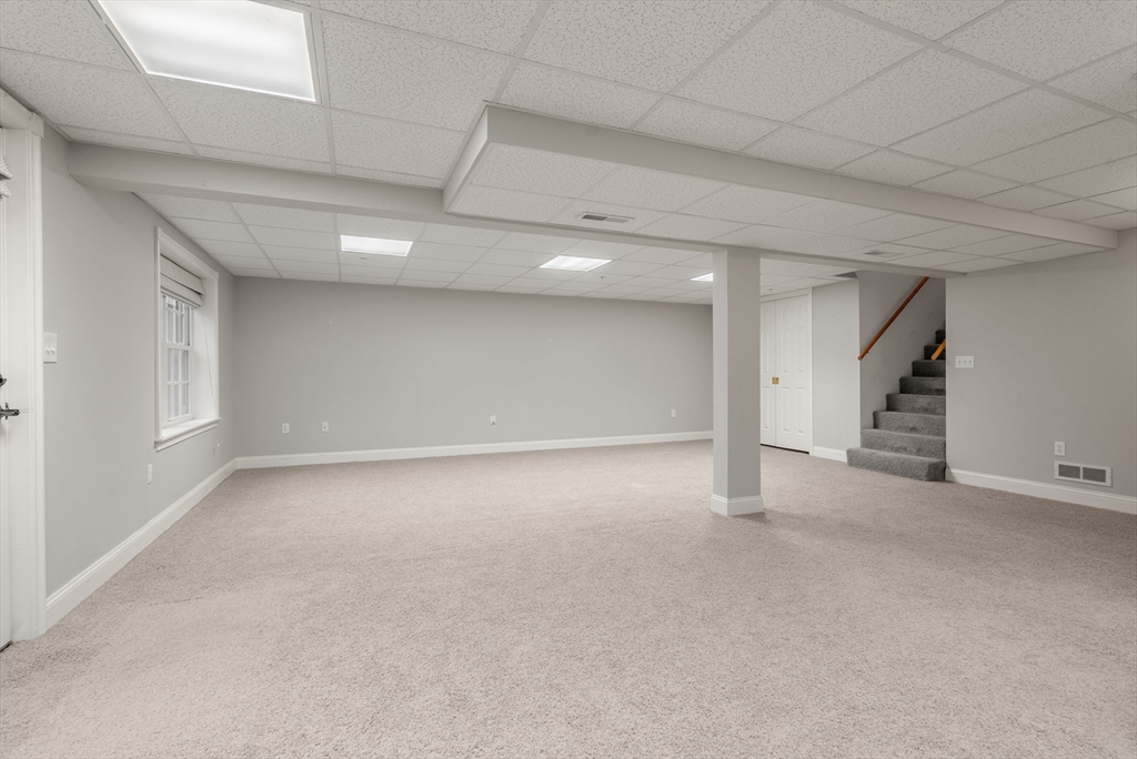 156 Canterbury Way, Unit 156 West Springfield, MA 01089 - Photo 26 of 32 a view of an empty room with a window