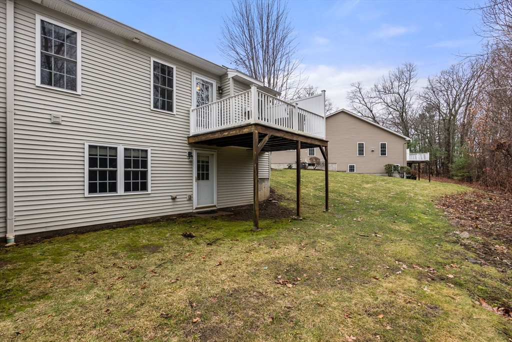156 Canterbury Way, Unit 156 West Springfield, MA 01089 - Photo 32 of 32 a house view with a backyard space