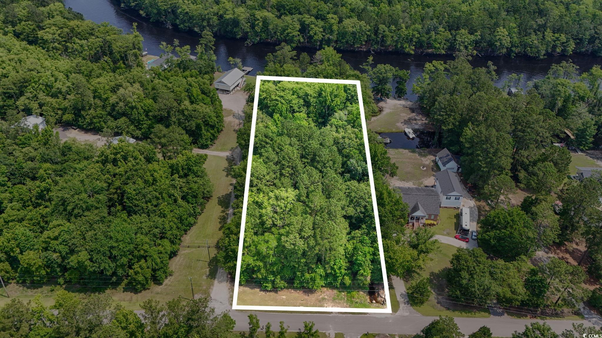 Tbd Riverside Drive Conway, SC 29526 - Photo 8 of 11 Bird's eye view of a nearby body of water and a fo
