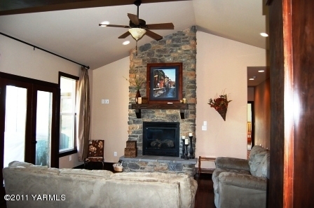 55 North Mize Road Yakima, WA 98908 - Photo 3 of 21 a living room with furniture and a fireplace