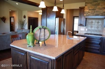 55 North Mize Road Yakima, WA 98908 - Photo 5 of 21 a kitchen with counter top space cabinets and stainless steel appliances
