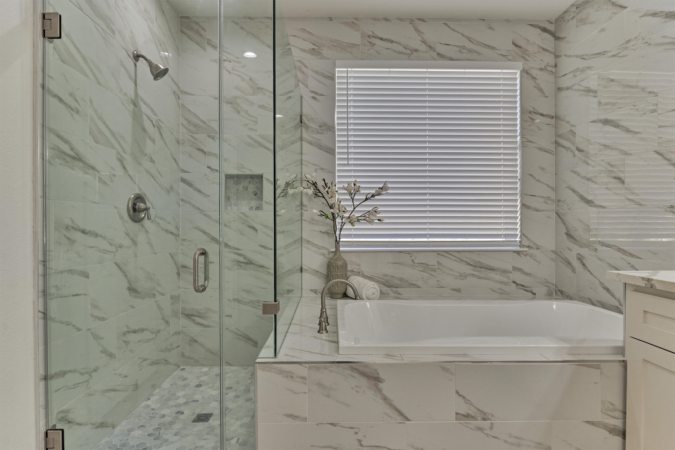 1718 Eastvale Drive Spring, TX 77386 - Photo 21 of 40 a bathroom with a bathtub and shower