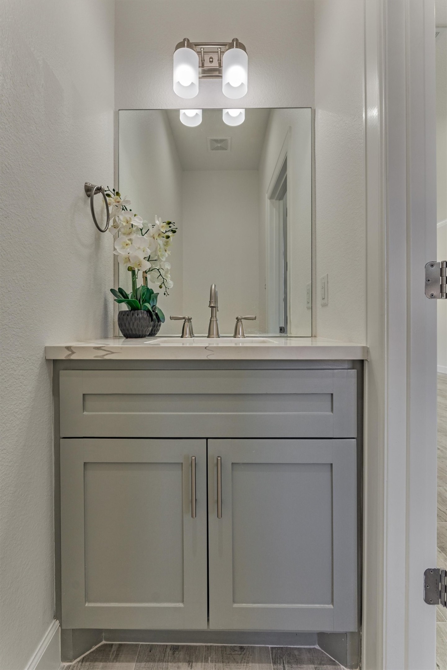 1718 Eastvale Drive Spring, TX 77386 - Photo 30 of 40 a bathroom with a sink and a mirror