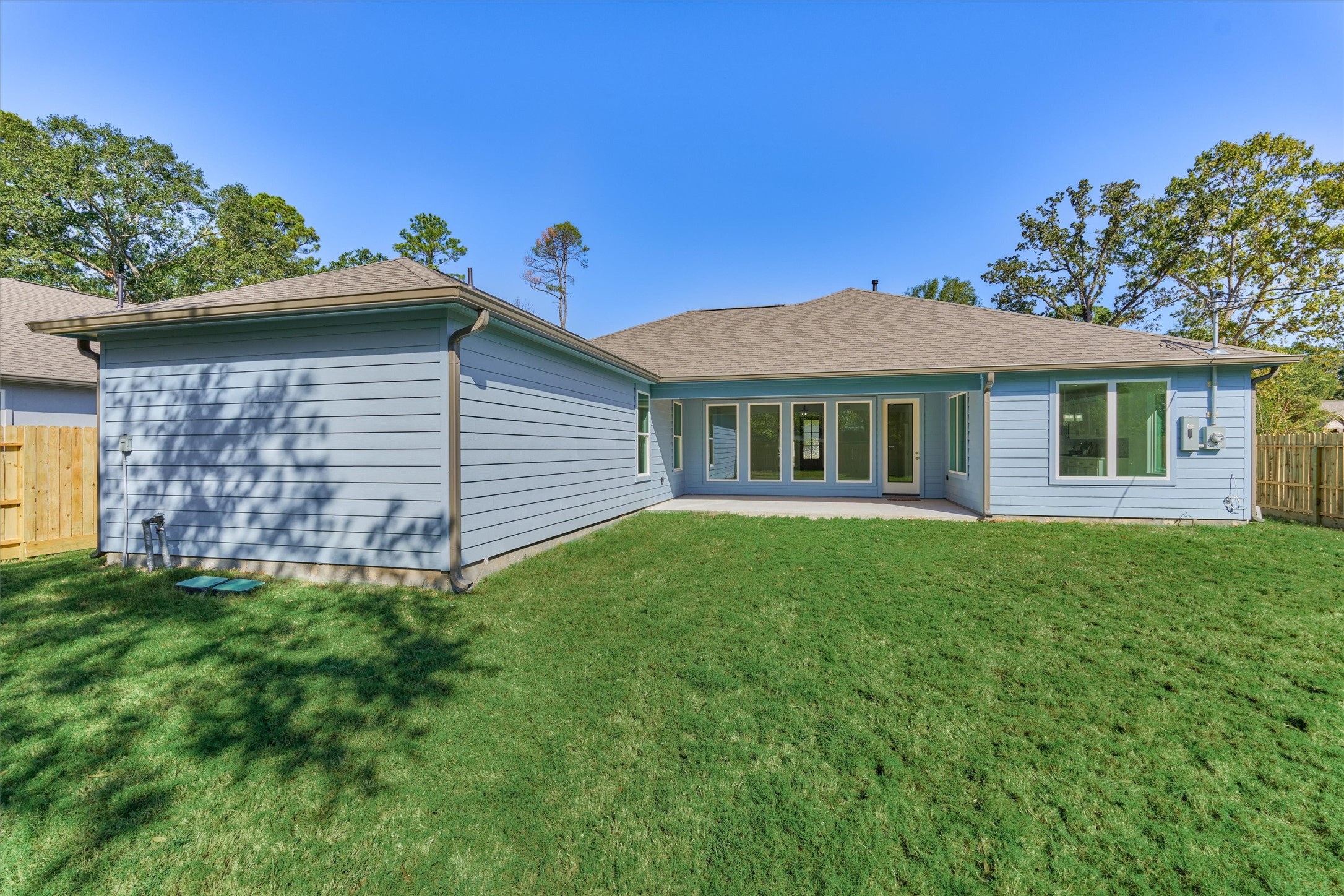 1718 Eastvale Drive Spring, TX 77386 - Photo 34 of 40 a view of a house with a yard