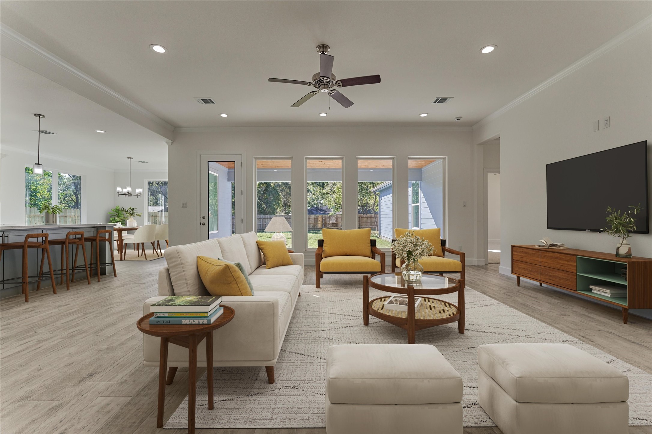1718 Eastvale Drive Spring, TX 77386 - Photo 38 of 40 a living room with furniture and a flat screen tv
