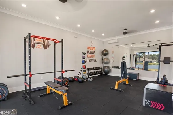 a room with gym equipment and a large window
