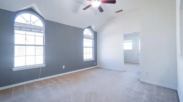 an empty room that has a window