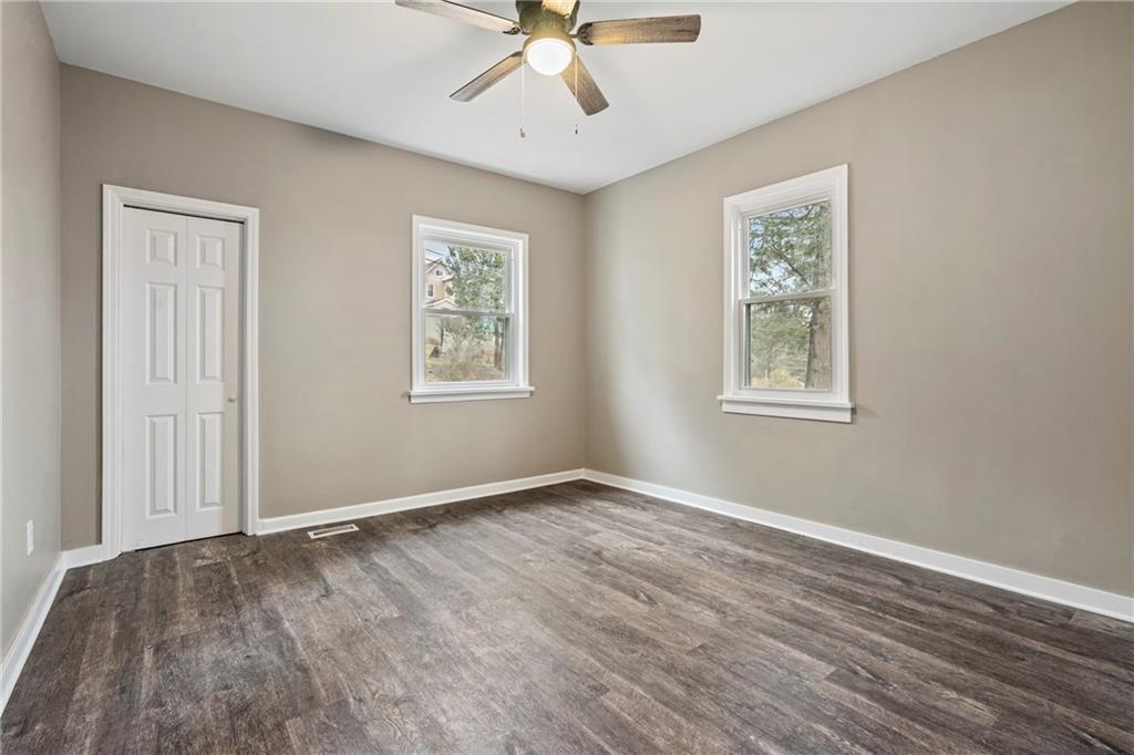 2215 Lehigh Street Pittsburgh, PA 15218 - Photo 15 of 32 wooden floor in an empty room with a window