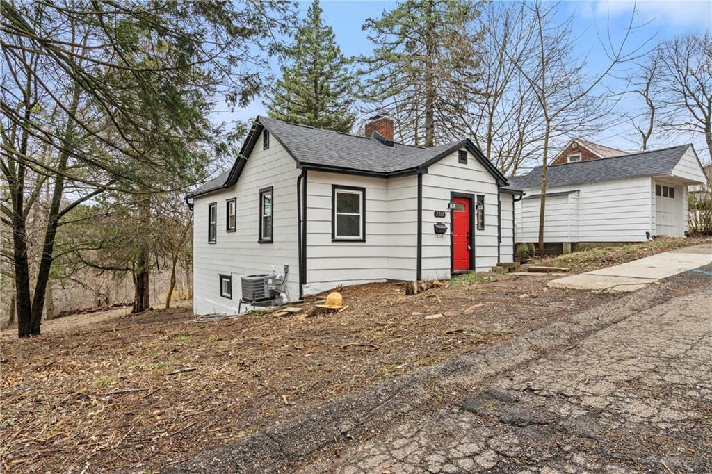 2215 Lehigh Street Pittsburgh, PA 15218 - Photo 2 of 32 a view of a house with a snow on the road