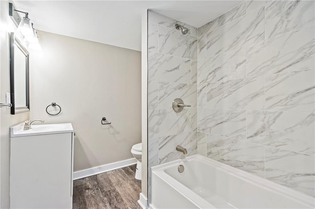 2215 Lehigh Street Pittsburgh, PA 15218 - Photo 27 of 32 a bathroom with a bathtub and shower