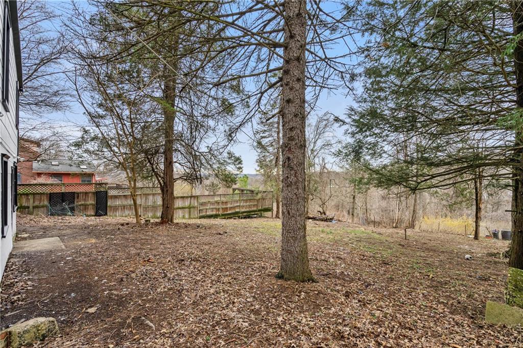 2215 Lehigh Street Pittsburgh, PA 15218 - Photo 31 of 32 a tree in front of a white house