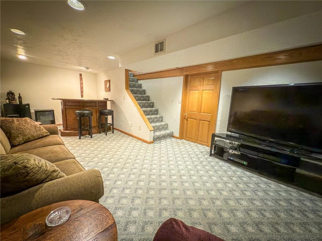 306 Chicora Road Butler, PA 16001 - Photo 19 of 30 a living room with furniture and a flat screen tv
