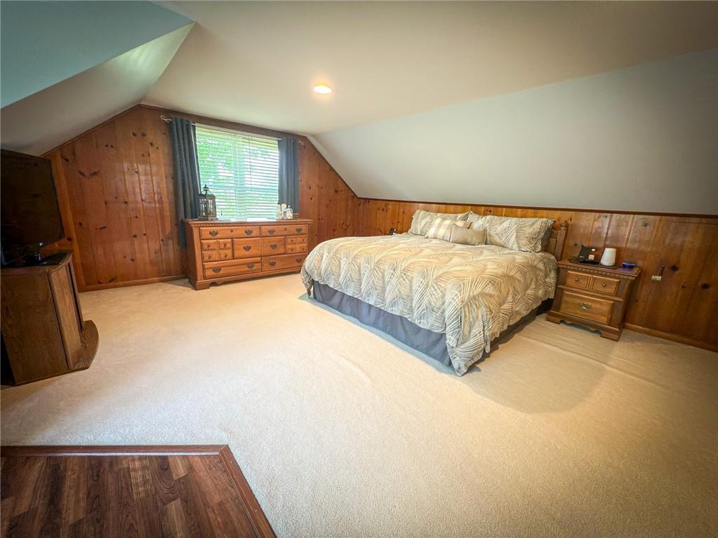 306 Chicora Road Butler, PA 16001 - Photo 20 of 30 a bed sitting in a room next to a lamp