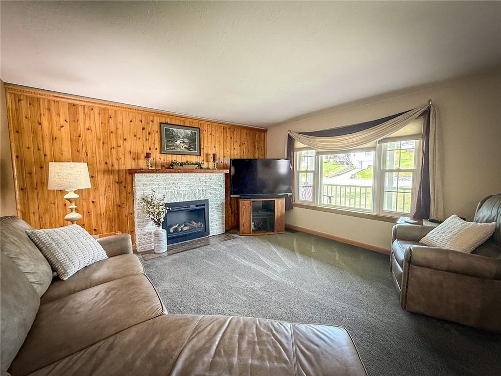306 Chicora Road Butler, PA 16001 - Photo 2 of 30 a living room with furniture and a fireplace