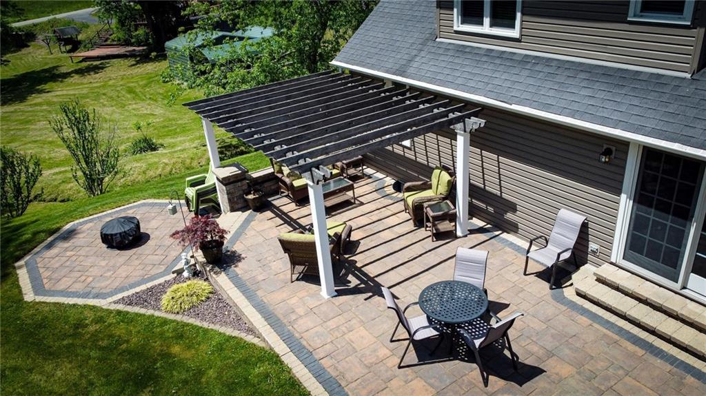 306 Chicora Road Butler, PA 16001 - Photo 24 of 30 a view of a backyard with chairs and a patio