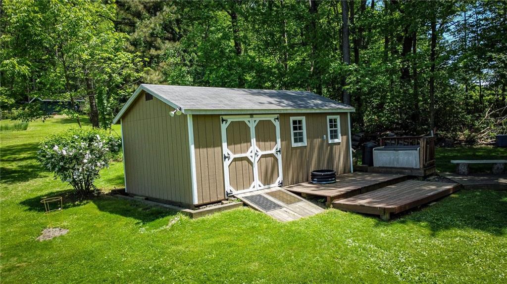 306 Chicora Road Butler, PA 16001 - Photo 26 of 30 a view of a backyard with table and chairs and a large tree