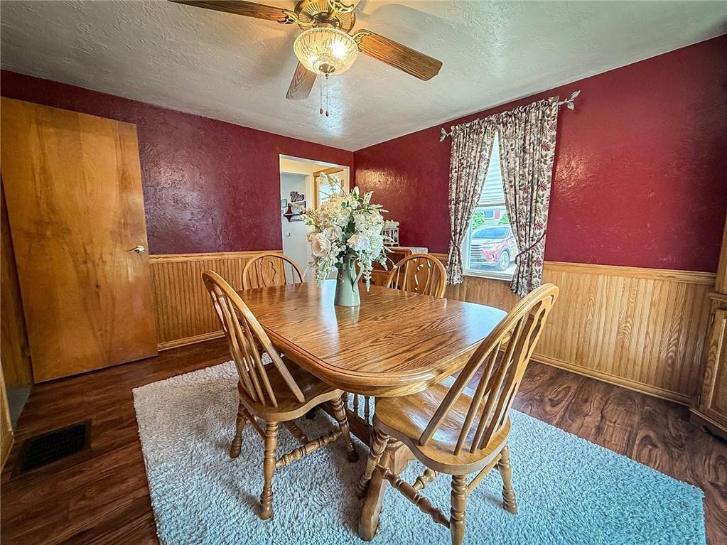 306 Chicora Road Butler, PA 16001 - Photo 7 of 30 a view of a dining room with furniture window and outside view