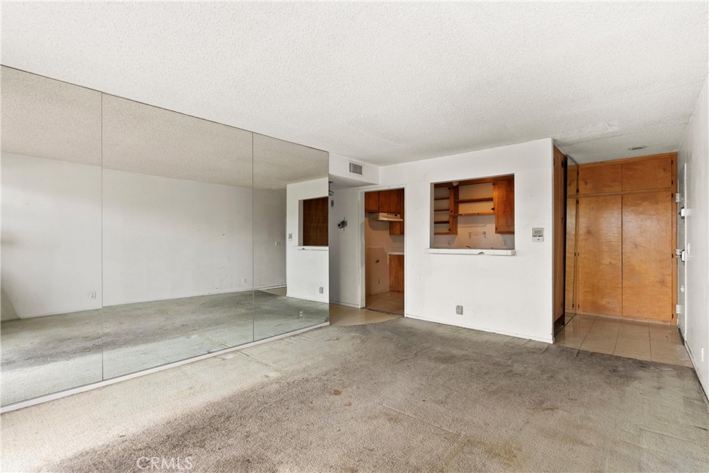 1140 Pacific Avenue, Unit 19 Long Beach, CA 90813 - Photo 11 of 31 Another View of the Living Room and Entry Way