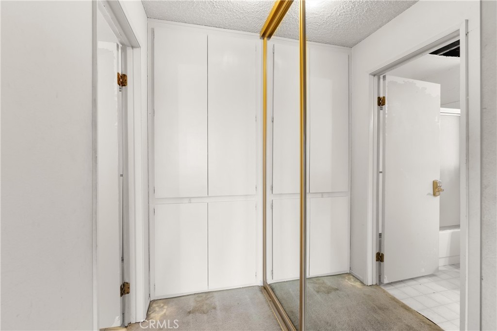 1140 Pacific Avenue, Unit 19 Long Beach, CA 90813 - Photo 22 of 31 Another View of Bedroom 2 (Primary Bedroom) - Closet and Linen Closet