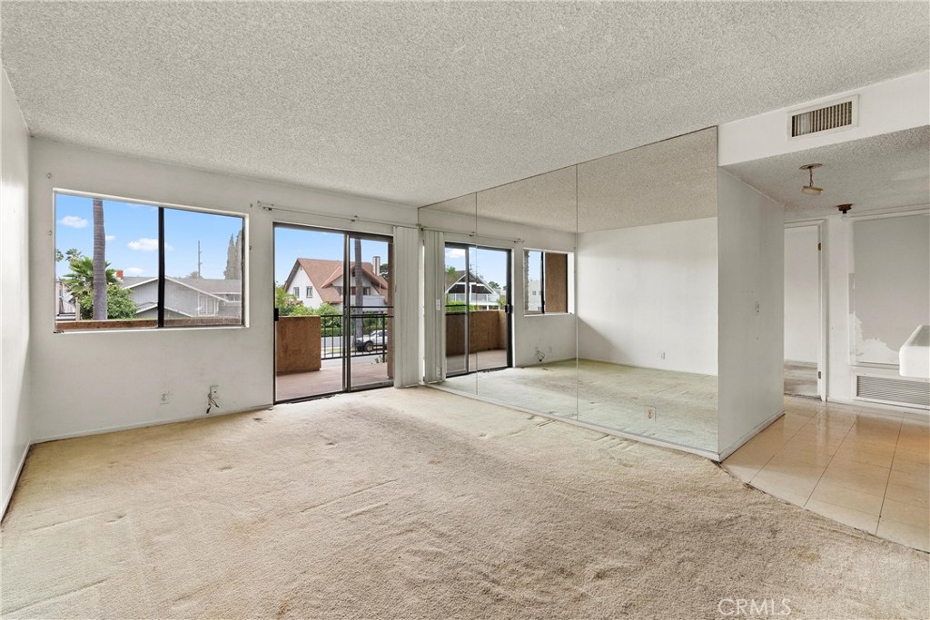 1140 Pacific Avenue, Unit 19 Long Beach, CA 90813 - Photo 8 of 31 Another View of the Living Room