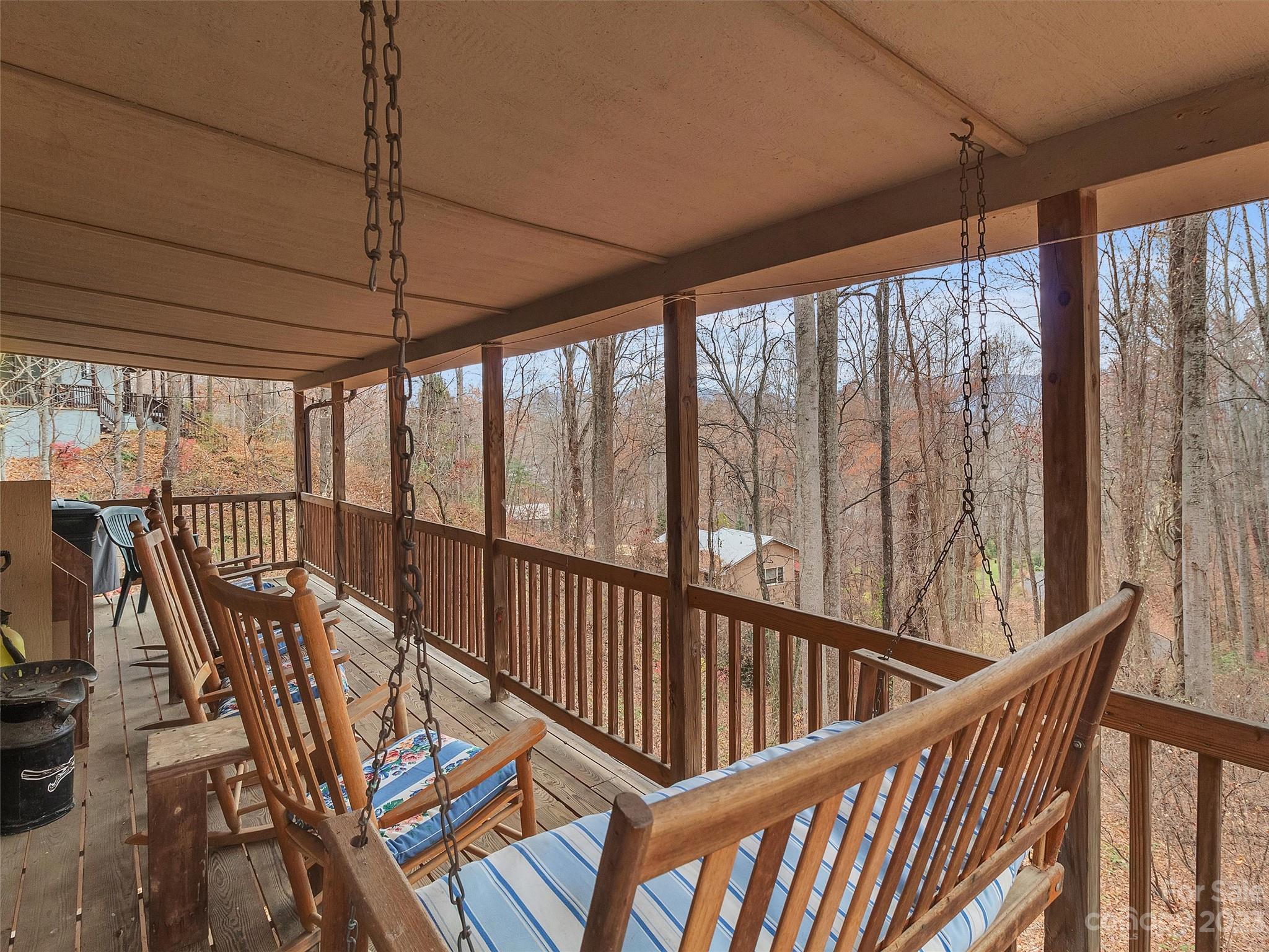 645 Mouzon Road Waynesville, NC 28785 - Photo 35 of 40 a view of a balcony with furniture