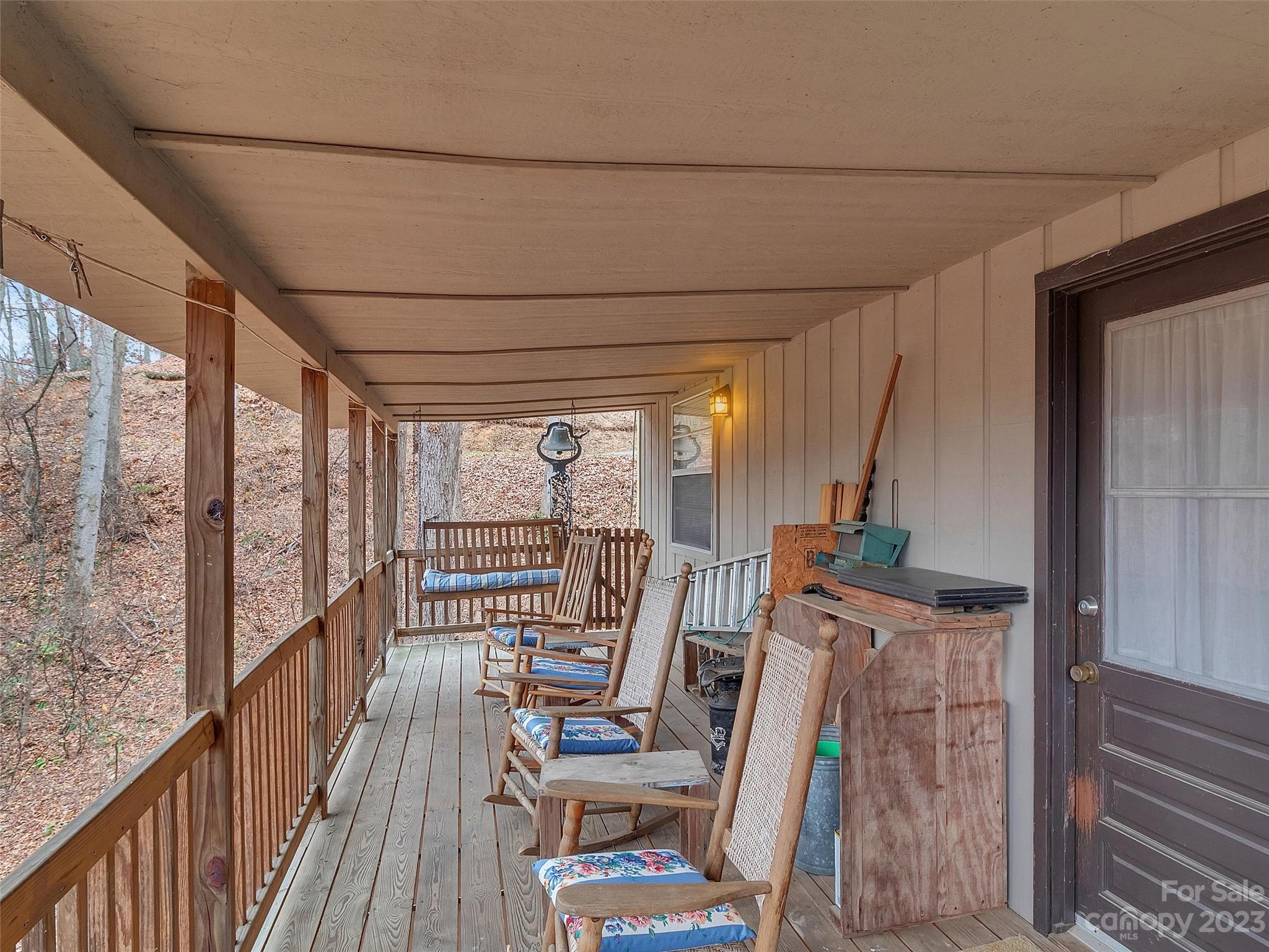 645 Mouzon Road Waynesville, NC 28785 - Photo 36 of 40 a view of living room with furniture and wooden floor