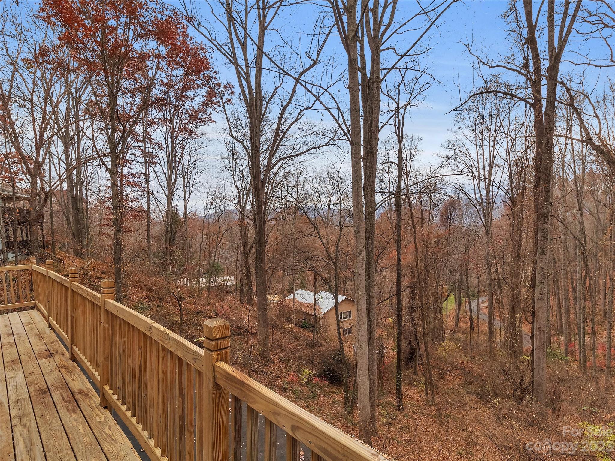 645 Mouzon Road Waynesville, NC 28785 - Photo 38 of 40 a view of a balcony with a yard