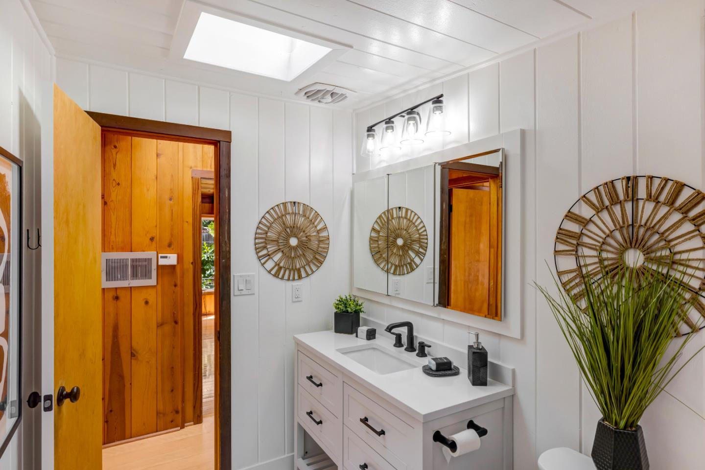 220 Lazy Woods Road Felton, CA 95018 - Photo 29 of 69 a bathroom with a sink a mirror and a shower