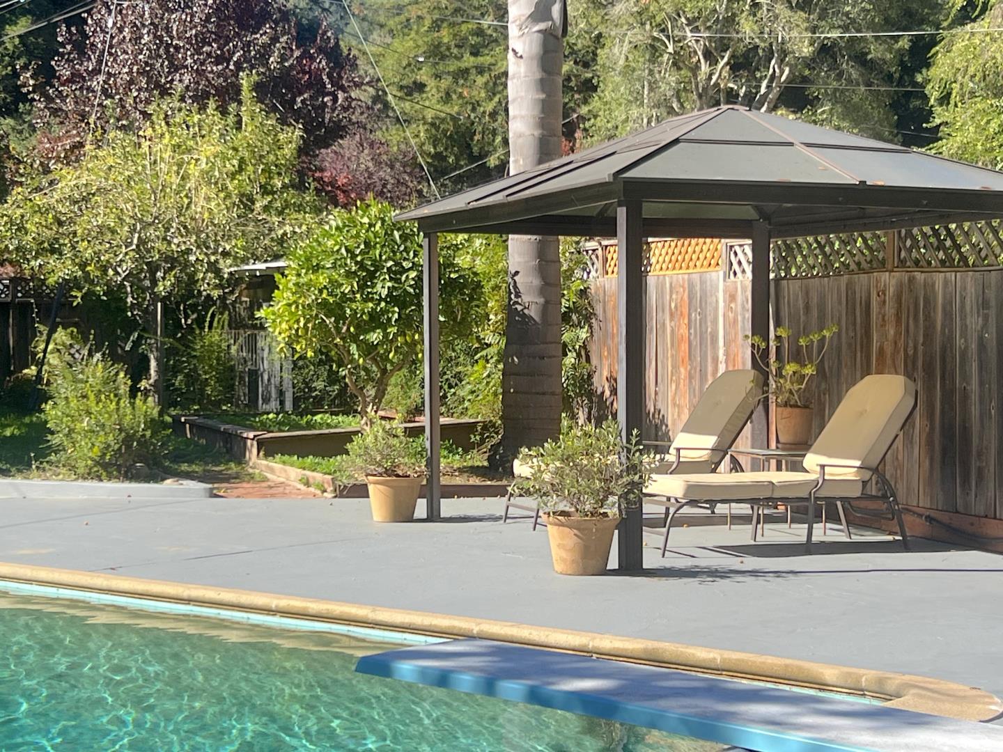 220 Lazy Woods Road Felton, CA 95018 - Photo 42 of 69 a view of a swimming pool with a patio