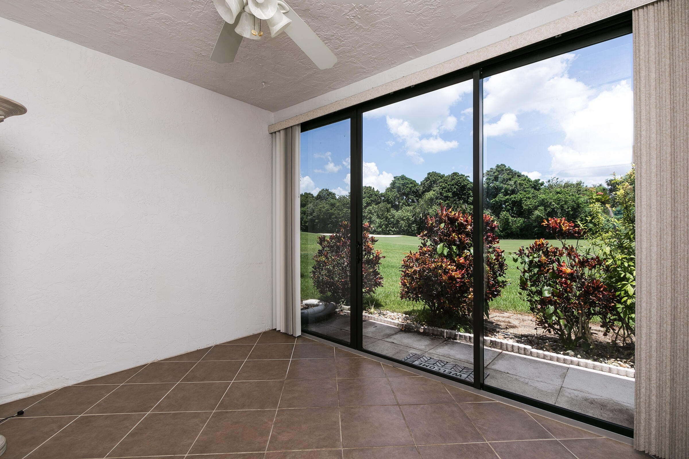 8535 Casa Del Lago, Unit 37E Boca Raton, FL 33433 - Photo 29 of 39 a view of a room with a large window