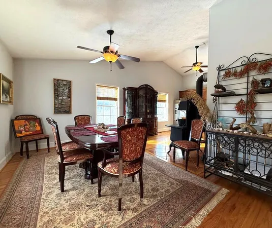 a view of a dining room with furniture