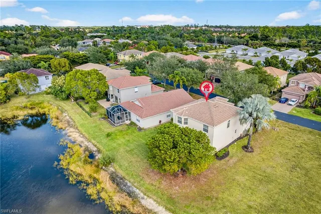 an aerial view of a house with a garden