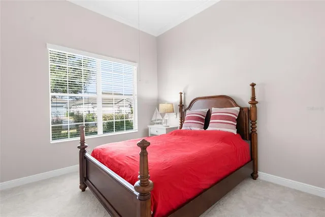 a room with gym equipment and a view of living room