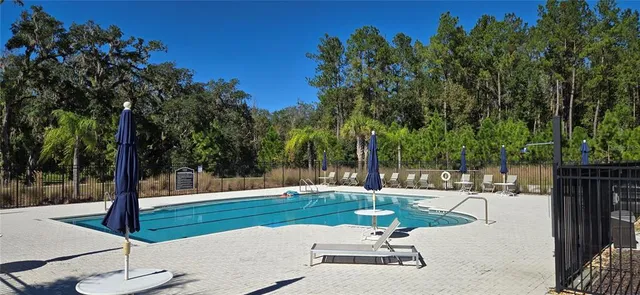 a view of an outdoor space with swimming pool