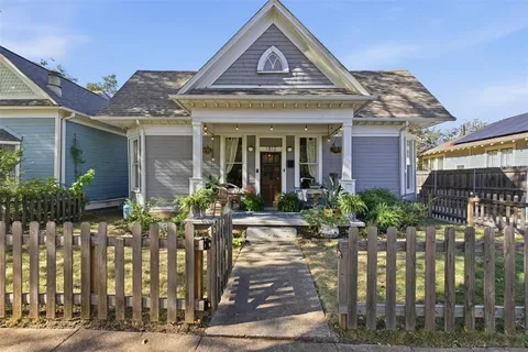 a front view of a house with yard