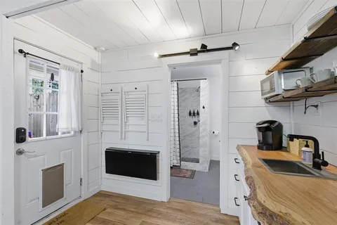 a view of a livingroom with a fireplace and furniture