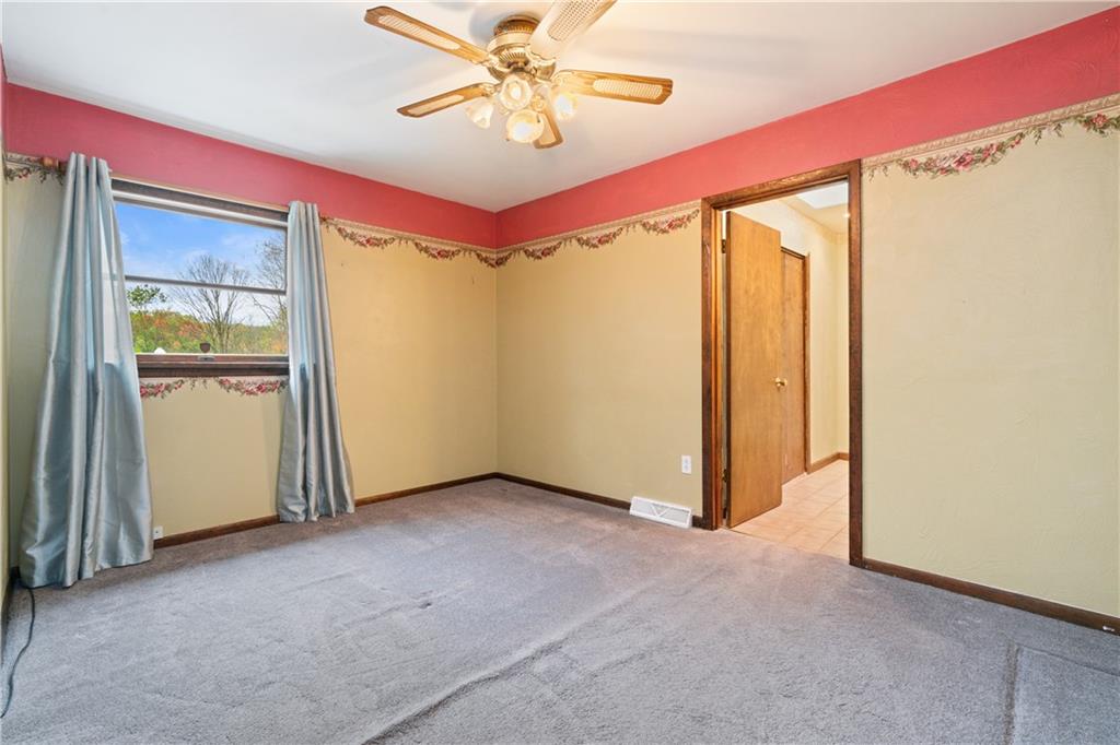 1302 Rankin Road McKeesport, PA 15131 - Photo 14 of 38 an empty room with windows and closet