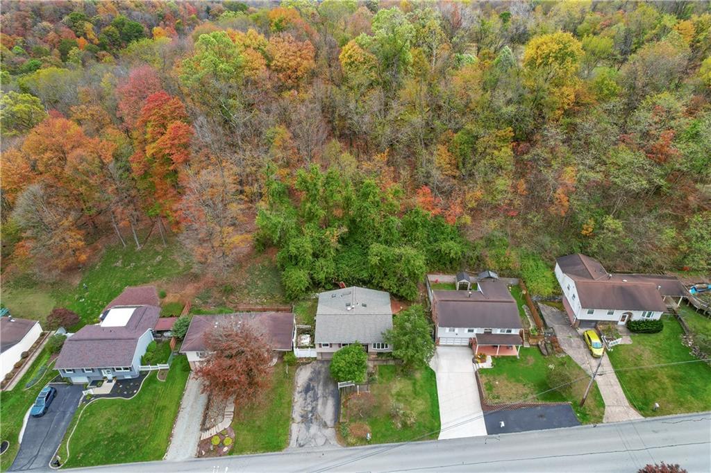 1302 Rankin Road McKeesport, PA 15131 - Photo 35 of 38 an aerial view of a house with a yard and lake view
