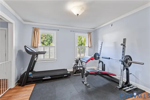 a room with gym equipment on the desk