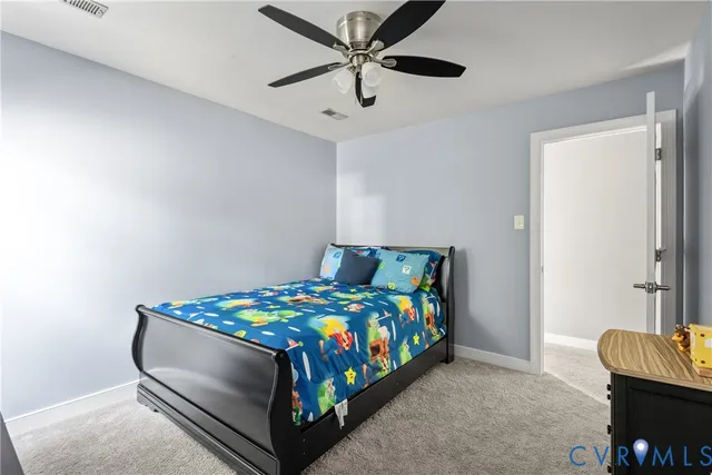 a bathroom with a sink a toilet a shower and a mirror