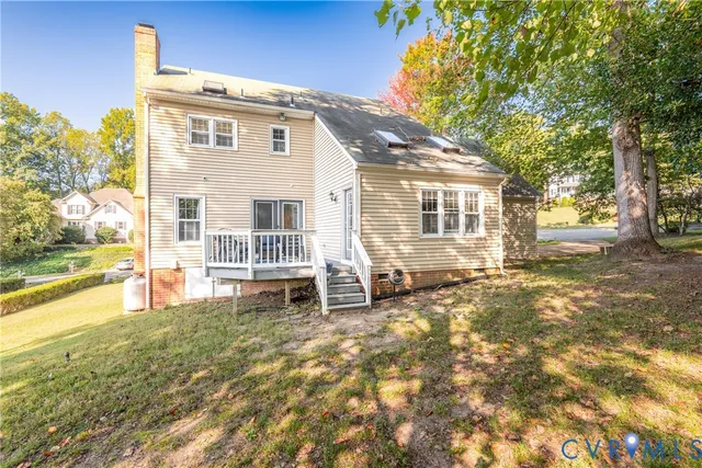 a view of balcony with wooden floor and outdoor seating