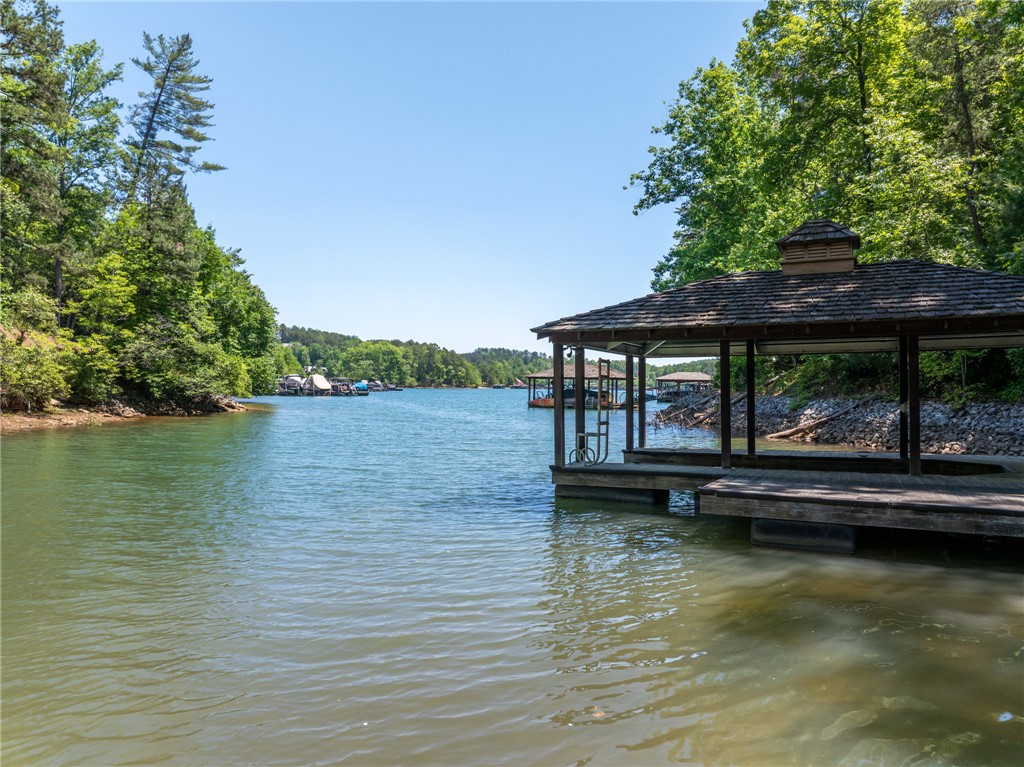 113 Sunrise Ridge Sunset, SC 29685 - Photo 4 of 14 This serene waterfront retreat features a private dock, offering direct access to tranquil waters.