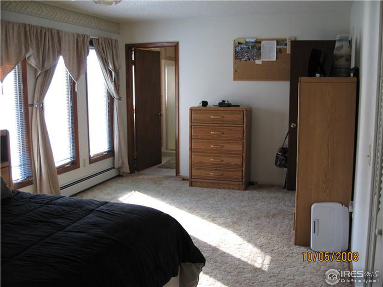 47 Reid Road Fort Morgan, CO 80701 - Photo 8 of 18 Master Bedroom