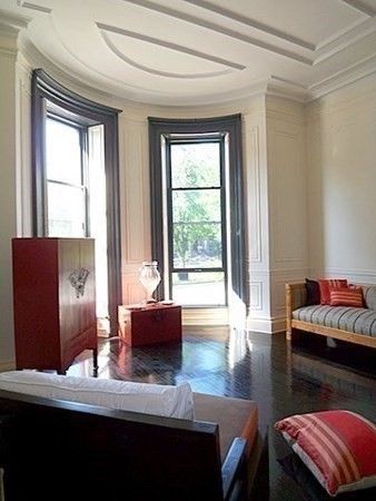 a dining room with a window