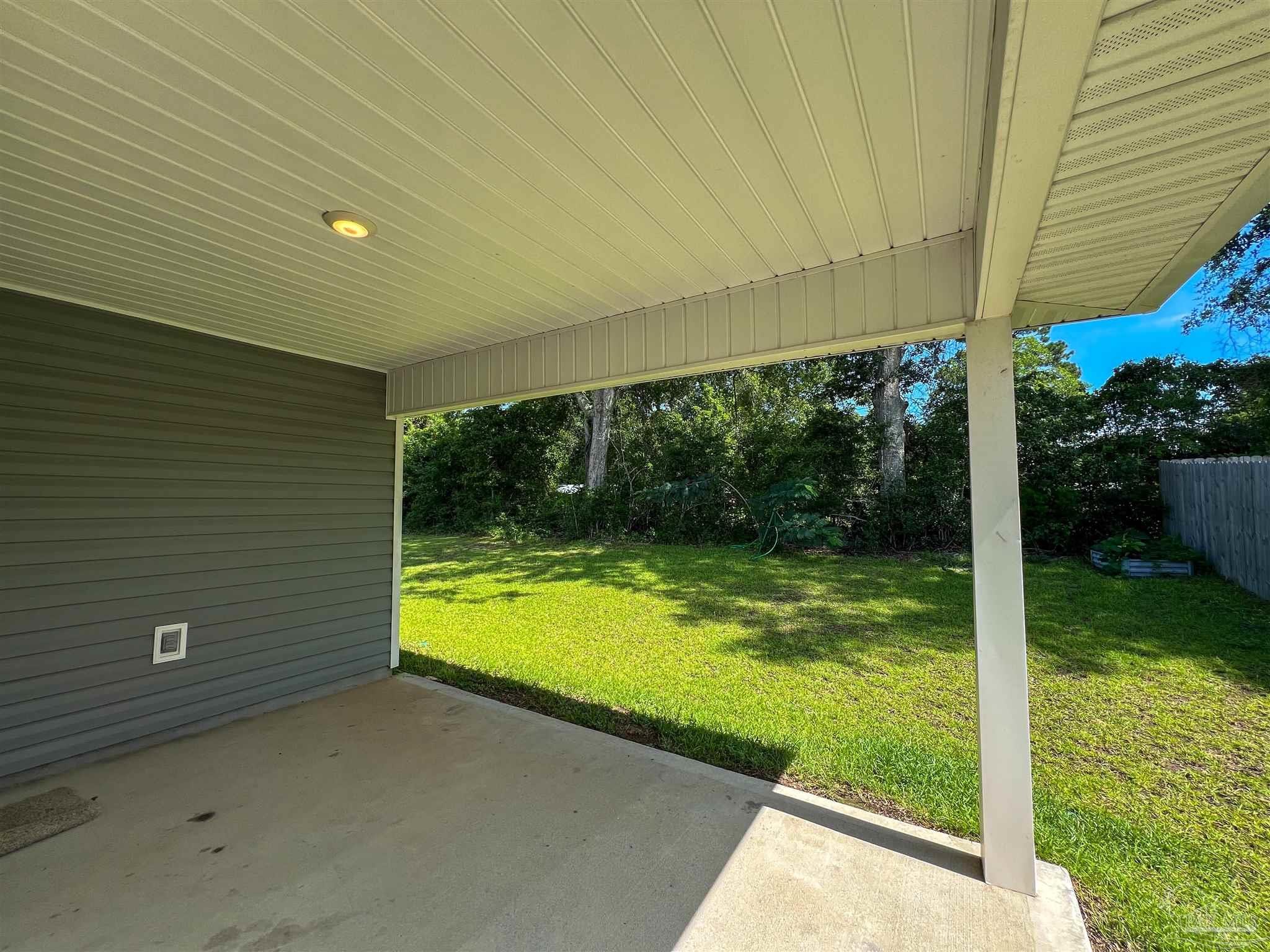 5257 Peach Drive Pace, FL 32571 - Photo 27 of 28 a view of a backyard
