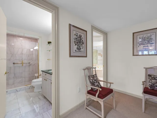 a bedroom with double bed and a window