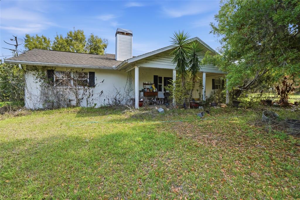 32430 Taylor Grade Parrish, FL 34219 - Photo 7 of 15 a front view of a house with a yard