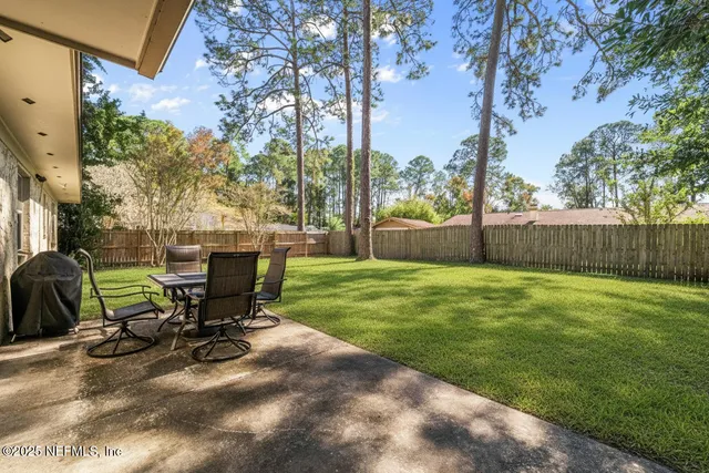 a view of an outdoor sitting area with fire pit