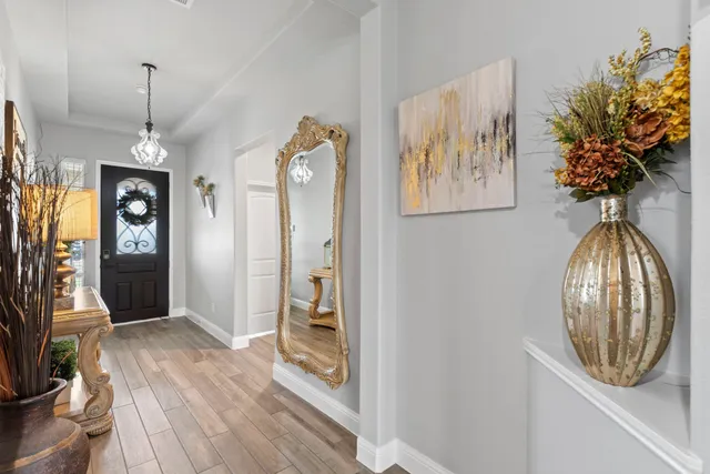 a view of livingroom with furniture and wooden floor